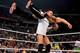 CM Punk hoists WWE Champion The Rock up for a GTS. (Courtesy of WWE.com)
