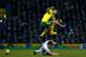 NORWICH, ENGLAND - FEBRUARY 9: Robert Snodgrass of Norwich City takes evasive action under pressure from John Arne Riise of Fulham during the Barclays Premier League match between Norwich City and Fulham at Carrow Road on February 9, 2013 in Norwich, England. (Photo by Jan Kruger/Getty Images)