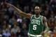 CHARLOTTE, NC - FEBRUARY 11: Kevin Garnett #5 of the Boston Celtics points to his teammates during their game against the Charlotte Bobcats at Time Warner Cable Arena on February 11, 2013 in Charlotte, North Carolina. NOTE TO USER: User expressly acknowledges and agrees that, by downloading and or using this photograph, User is consenting to the terms and conditions of the Getty Images License Agreement. (Photo by Streeter Lecka/Getty Images)