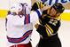 BOSTON, MA - JANUARY 19: Mike Rupp #17 of the New York Rangers and Shawn Thornton #22 of the Boston Bruins fights during the season opener game on January 19, 2013 at TD Garden in Boston, Massachusetts. (Photo by Jared Wickerham/Getty Images)