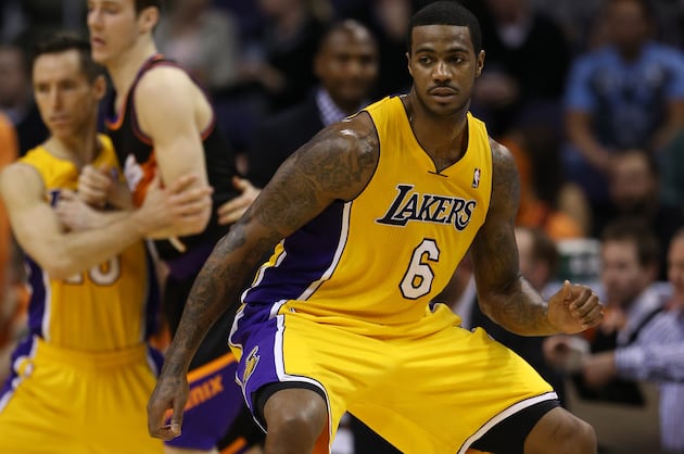 Earl Clark's X-Rays Negative; Will Play Tonight