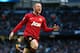 Rooney celebrates another of his key strikes for Manchester United.