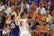 February 12, 2013; Gainesville, FL, USA; Florida Gators guard Scottie Wilbekin (5) shoots as he is fouled by Kentucky Wildcats forward Kyle Wiltjer (33) during the second half at the Stephen C. O'Connell Center. Florida won 69-52. Mandatory USA TODAY Sports