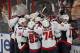SUNRISE, FL - FEBRUARY 12: The Washington Capitals mob Troy Brouwer #20 after he scored the game-winning goal in overtime against the Florida Panthers at the BB&T Center on February 12, 2013 in Sunrise, Florida. The Capitals defeated the Panthers 6-5 in overtime.(Photo by Joel Auerbach/Getty Images)
