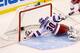 BOSTON, MA - JANUARY 19: Henrik Lundqvist #30 of the New York Rangers just misses a save that resulted in a goal by the Boston Bruins in the second period during the season opener game on January 19, 2013 at TD Garden in Boston, Massachusetts. (Photo by Jared Wickerham/Getty Images)