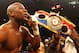 LAS VEGAS, NV - MAY 05: Floyd Mayweather Jr. celebrates after defeating Miguel Cotto by unanimous decision during their WBA super welterweight title fight at the MGM Grand Garden Arena on May 5, 2012 in Las Vegas, Nevada. (Photo by Al Bello/Getty Images)