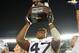 Ezekiel Ansah's remarkable journey at BYU ended with a Poinsettia Bowl victory.