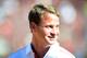 LOS ANGELES, CA - SEPTEMBER 01: Head Coach Lane Kiffin of the USC Trojans smiles as he comes onto the field before the game against the Hawaii Warriors at Los Angeles Coliseum on September 1, 2012 in Los Angeles, California. (Photo by Harry How/Getty Images)