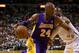 MIAMI, FL - FEBRUARY 10: Kobe Bryant #24 of the Los Angeles Lakers drives around Dwyane Wade #3 of the Miami Heat during a game at American Airlines Arena on February 10, 2013 in Miami, Florida. (Photo by Mike Ehrmann/Getty Images)