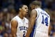 DURHAM, NC - FEBRUARY 13: Teammates Quinn Cook #2 and Rasheed Sulaimon #14 of the Duke Blue Devils celebrate after a play during their game against the North Carolina Tar Heels at Cameron Indoor Stadium on February 13, 2013 in Durham, North Carolina. (Photo by Streeter Lecka/Getty Images)