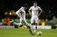 LONDON, ENGLAND - FEBRUARY 14: Gareth Bale of Spurs scores his team's match winning second goal from a free kick during the UEFA Europa League round of 32 first leg match between Tottenham Hotspur and Olympique Lyonnais at White Hart Lane on February 14, 2013 in London, England. (Photo by Paul Gilham/Getty Images)