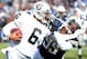 SAN DIEGO, CA - DECEMBER 30: Terrelle Pryor #6 of the Oakland Raiders is stopped for a loss by Shaun Phillips #95 of the San Diego Chargers at Qualcomm Stadium on December 30, 2012 in San Diego, California. (Photo by Harry How/Getty Images)