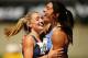 SYDNEY, AUSTRALIA - MARCH 16: Michelle Jenneke (R) of NSW celebrates with 2nd placegetter Abble Taddeo (L) of NSW after winning the Womens U20 100m Hurdles Final during day three of the Australian Junior Athletics Championships at Sydney Olympic Park Athletic Centre on March 16, 2012 in Sydney, Australia. (Photo by Matt King/Getty Images)