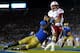 PASADENA, CA - SEPTEMBER 08: Quarterback Taylor Martinez #3 of the Nebraska Cornhuskers is tackled for a safety by defensive end Datone Jones #56 of the UCLA Bruins in the fourth quarter at the Rose Bowl on September 8, 2012 in Pasadena, California. UCLA won 36-30. (Photo by Stephen Dunn/Getty Images)