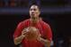 Feb 11, 2013; Chicago, IL, USA; Chicago Bulls injured point guard Derrick Rose shoots before the game against the San Antonio Spurs at the United Center. Mandatory Credit: Jerry Lai-USA TODAY Sports