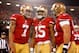 Jan 12, 2013; San Francisco, CA, USA; San Francisco 49ers wide receiver Michael Crabtree (15) celebrates with quarterback Colin Kaepernick (7) and center Jonathan Goodwin (59) after scoring a touchdown against the Green Bay Packers during the second quarter of the NFC divisional round playoff game at Candlestick Park. The 49ers defeated the Packers 45-31. Mandatory Credit: Cary Edmondson-USA TODAY Sports