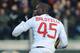 CAGLIARI, ITALY - FEBRUARY 10: Mario Balotelli of AC Milan celebrates his goal from the penalty spot during the Serie A match between Cagliari Calcio and AC Milan at Stadio Is Arenas on February 10, 2013 in Cagliari, Italy. (Photo by Valerio Pennicino/Getty Images)