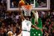 BOSTON, MA - FEBRUARY 13: Jeff Green #8 of the Boston Celtics goes up for a dunk in front of Carlos Boozer #5 and Luol Deng #9 of the Chicago Bulls during the game on February 13, 2013 at TD Garden in Boston, Massachusetts. NOTE TO USER: User expressly acknowledges and agrees that, by downloading and or using this photograph, User is consenting to the terms and conditions of the Getty Images License Agreement. (Photo by Jared Wickerham/Getty Images)