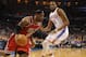 Feb 14, 2013; Oklahoma City, OK, USA; Miami Heat forward LeBron James (6) handles the ball against Oklahoma City Thunder forward Kevin Durant (35) during the first half at the Chesapeake Energy Arena. Mandatory Credit: Mark D. Smith-USA TODAY Sports