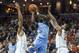 Jan 6, 2013; Charlottesville, VA, USA; North Carolina Tar Heels guard P.J. Hairston (15) shoots the ball against Virginia Cavaliers forward Akil Mitchell (25) and guard Justin Anderson (23) at John Paul Jones Arena. Mandatory Credit: Peter Casey-USA TODAY Sports