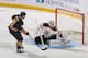 BUFFALO, NY - NOVEMBER 23: Tim Thomas #30 of the Boston Bruins makes a glove save on Drew Stafford #21 of the Buffalo Sabres in the shootout
at First Niagara Center on November 23, 2011 in Buffalo, New York. Boston won 4-3 in a shootout. (Photo by Rick Stewart/Getty Images)
