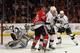 CHICAGO, IL - DECEMBER 28: Matt Greene #2 of the Los Angeles Kings clears the puck in front of Jonathan Quick #32 and Jonathan Toews #19 of the Chicago Blackhawks at the United Center on December 28, 2011 in Chicago, Illinois. The Kings defeated the Blackhawks 2-0. (Photo by Jonathan Daniel/Getty Images)