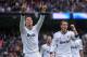 MADRID, SPAIN - JANUARY 27: Cristiano Ronaldo (L) of Real Madrid CF celebrates with Mesut Ozil after scoreding Real's 2nd goal during the La Liga match between Real Madrid CF and Getafe CF at estadio Santiago Bernabeu on January 27, 2013 in Madrid, Spain. (Photo by Denis Doyle/Getty Images)