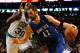 BOSTON, MA - DECEMBER 5: Kevin Love #42 of the Minnesota Timberwolves drives to the basket in front of Brandon Bass #30 of the Boston Celtics during the game on December 5, 2012 at TD Garden in Boston, Massachusetts. NOTE TO USER: User expressly acknowledges and agrees that, by downloading and or using this photograph, User is consenting to the terms and conditions of the Getty Images License Agreement. (Photo by Jared Wickerham/Getty Images)