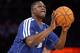 Feb 16, 2013; Houston, TX, USA; NBA former player Dominique Wilkins competes during the 2013 NBA all star shooting stars competition at the Toyota Center. Mandatory Credit: Brett Davis-USA TODAY Sports