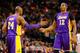 BOSTON, MA - FEBRUARY 7: Dwight Howard #12 of the Los Angeles Lakers is congratulated by teammate Kobe Bryant #24 of the Los Angeles Lakers against the Boston Celtics during the game on February 7, 2013 at TD Garden in Boston, Massachusetts. NOTE TO USER: User expressly acknowledges and agrees that, by downloading and or using this photograph, User is consenting to the terms and conditions of the Getty Images License Agreement. (Photo by Jared Wickerham/Getty Images)