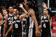 ATLANTA, GA - JANUARY 19: Tony Parker #9 celebrates with Kawhi Leonard #2 of the San Antonio Spurs and Danny Green #4 after a basket in the final seconds against the Atlanta Hawks at Philips Arena on January 19, 2013 in Atlanta, Georgia. NOTE TO USER: User expressly acknowledges and agrees that, by downloading and or using this photograph, User is consenting to the terms and conditions of the Getty Images License Agreement. (Photo by Kevin C. Cox/Getty Images)