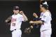MINNEAPOLIS, MN - SEPTEMBER 28: (L-R) Glen Perkins #15, Joe Mauer #7 and Trevor Plouffe #24 of the Minnesota Twins celebrate a win of the game against the Detroit Tigers on September 28, 2012 at Target Field in Minneapolis, Minnesota. (Photo by Hannah Foslien/Getty Images)
