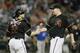 PHOENIX, AZ - SEPTEMBER 29: Pitcher Trevor Cahill #35 of the Arizona Diamondbacks is congratulated by catcher Miguel Montero #26 after pitching a four hit, nine strikeout complete game in their 8-2 victory over the Chicago Cubs during a MLB game at Chase Field on September 29, 2012 in Phoenix, Arizona. (Photo by Ralph Freso/Getty Images)