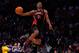 HOUSTON, TX - FEBRUARY 16: Terrence Ross of the Toronto Raptors jumps over a ball kid in his final dunk during the Sprite Slam Dunk Contest part of 2013 NBA All-Star Weekend at the Toyota Center on February 16, 2013 in Houston, Texas. NOTE TO USER: User expressly acknowledges and agrees that, by downloading and or using this photograph, User is consenting to the terms and conditions of the Getty Images License Agreement. (Photo by Scott Halleran/Getty Images)