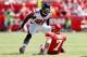 KANSAS CITY, MO - SEPTEMBER 09: Strong safety William Moore #25 of the Atlanta Falcons defends as quarterback Matt Cassel #7 of the Kansas City Chiefs slides during the game at Arrowhead Stadium on September 9, 2012 in Kansas City, Missouri. (Photo by Jamie Squire/Getty Images)