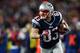 FOXBORO, MA - JANUARY 13: Wes Welker #83 of the New England Patriots runs with the ball against the Houston Texans during the 2013 AFC Divisional Playoffs game at Gillette Stadium on January 13, 2013 in Foxboro, Massachusetts. (Photo by Elsa/Getty Images)