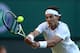 LONDON, ENGLAND - JUNE 28: Rafael Nadal reaches for a shot during his Gentlemen's Singles second round match against Lukas Rosol of the Czech Republic on day four of the Wimbledon Lawn Tennis Championships at the All England Lawn Tennis and Croquet Club on June 28, 2012 in London, England. (Photo by Clive Rose/Getty Images)