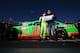 DAYTONA BEACH, FL - FEBRUARY 17: Danica Patrick, driver of the #10 GoDaddy.com Chevrolet, poses with team owner Tony Stewart holding the Coors Light Poll Award after qualifying for the NASCAR Sprint Cup Series Daytona 500 at Daytona International Speedway on February 17, 2013 in Daytona Beach, Florida. (Photo by Jonathan Ferrey/Getty Images)