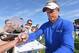 MARANA, AZ - FEBRUARY 18: Luke Donald of England signs an autograph during practice prior to the start of the World Golf Championships-Accenture Match Play Championship at the Ritz-Carlton Golf Club on February 18, 2013 in Marana, Arizona. (Photo by Stuart Franklin/Getty Images)