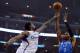 LOS ANGELES, CA - JANUARY 22: Russell Westbrook #0 of the Oklahoma City Thunder shoots a jumper over DeAndre Jordan #6 of the Los Angeles Clippers at Staples Center on January 22, 2013 in Los Angeles, California. NOTE TO USER: User expressly acknowledges and agrees that, by downloading and or using this photograph, User is consenting to the terms and conditions of the Getty Images License Agreement. (Photo by Harry How/Getty Images)