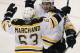 WINNIPEG, MB - FEBRUARY 17: Patrice Bergeron #37 of the Boston Bruins congratulates Brad Marchand #63 for his goal against the Winnipeg Jets during third period action on February 17, 2013 at the MTS Centre in Winnipeg, Manitoba, Canada. (Photo by Marianne Helm/Getty Images)