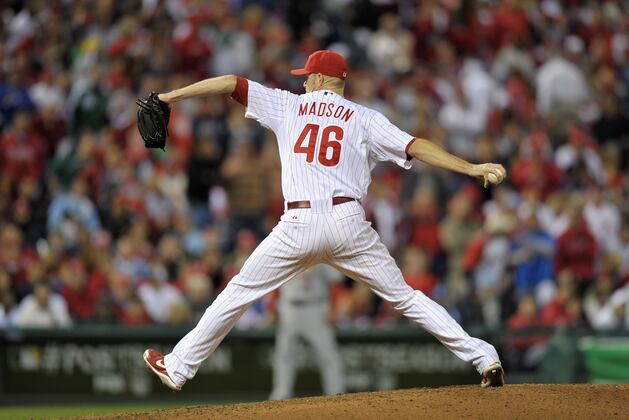 Burnett Slowed by Sore Back, but Madson Throwing Again