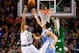 BOSTON, MA - FEBRUARY 10: Avery Bradley #0 of the Boston Celtics takes a shot over JaVale McGee #34 of the Denver Nuggets during the game on February 10, 2013 at TD Garden in Boston, Massachusetts. NOTE TO USER: User expressly acknowledges and agrees that, by downloading and or using this photograph, User is consenting to the terms and conditions of the Getty Images License Agreement. (Photo by Jared Wickerham/Getty Images)