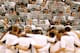 EAST LANSING, MI - JANUARY 31: Michigan State students read papers while the Illinois Fighting Illini starters are introduced at the Jack T. Breslin Student Events Center on January 31, 2013 in East Lansing, Michigan. (Photo by Gregory Shamus/Getty Images)