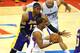 January 4, 2013; Los Angeles, CA, USA; Los Angeles Lakers center Dwight Howard (12) guards Los Angeles Clippers point guard Chris Paul (3) as he gets set to pass to power forward Blake Griffin (32) during the game against the Los Angeles Lakers at the Staples Center. Clippers won 107-102. Mandatory Credit: Jayne Kamin-Oncea-USA TODAY Sports