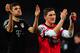 LONDON, ENGLAND - FEBRUARY 19: Thomas Mueller and Bastian Schweinsteiger of Bayern Muenchen applaud the fans after the UEFA Champions League round of 16 first leg match between Arsenal and Bayern Muenchen at Emirates Stadium on February 19, 2013 in London, England. (Photo by Shaun Botterill/Getty Images)