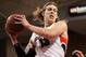 SPOKANE, WA - JANUARY 24: Kelly Olynyk #13 of the Gonzaga Bulldogs grabs a rebound during the game against the BYU Cougars at McCarthey Athletic Center on January 24, 2013 in Spokane, Washington. (Photo by William Mancebo/Getty Images)