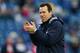 Kubiak applauds the empty backfield.