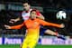 GRANADA, SPAIN - FEBRUARY 16: Alexis Sanchez of FC Barcelona duels for the ball with Inigo Lopez of Granada CF during the La Liga match between Granada CF and FC Barcelona at Estadio Nuevo Los Carmenes on February 16, 2013 in Granada, Spain. (Photo by David Ramos/Getty Images)