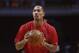 Feb 11, 2013; Chicago, IL, USA; Chicago Bulls injured point guard Derrick Rose shoots before the game against the San Antonio Spurs at the United Center. Mandatory Credit: Jerry Lai-USA TODAY Sports